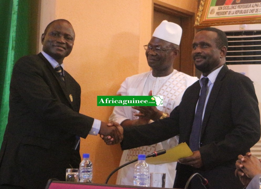 Lansana Komara (g) Bouréma Condé (m) Aboubacar Sylla (d)
