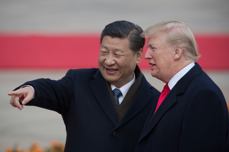 Les présidents Xi Jinping et Donald Trump-AFP