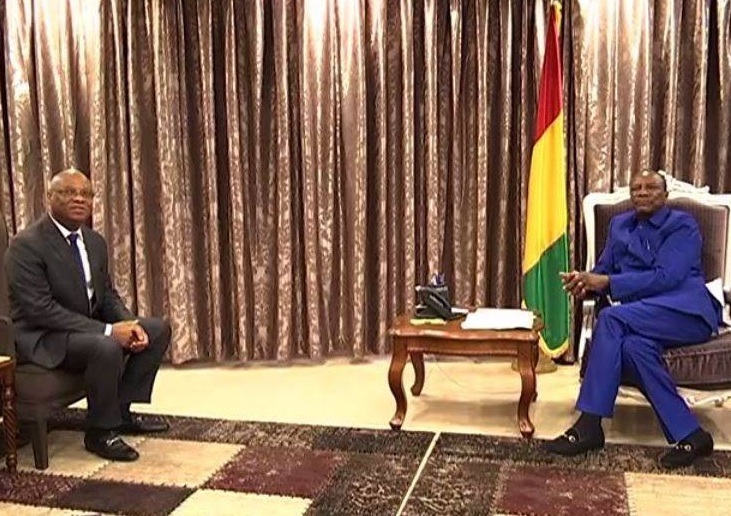 Jean Claude Kassi Brou et le Président Alpha Condé à Conakry à Conakry