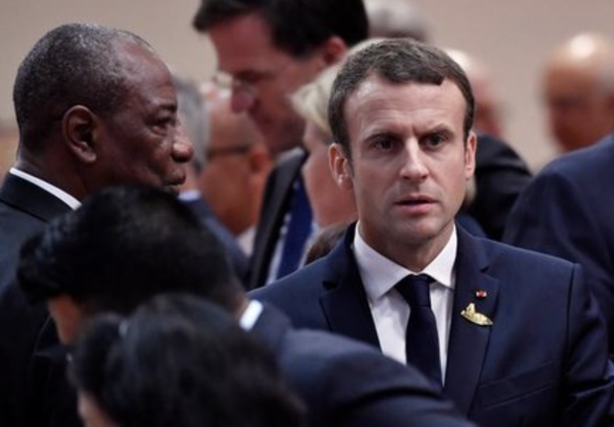 Alpha Condé et Emmanuel Macron lors d'un sommet du G29 à Berlin