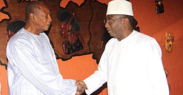 Alpha Condé, président de la République de Guinée et Sidya Touré