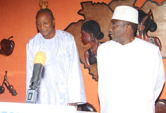 Alpha Condé, président de la République de Guinée et Sidya Touré, leader de l'UFR