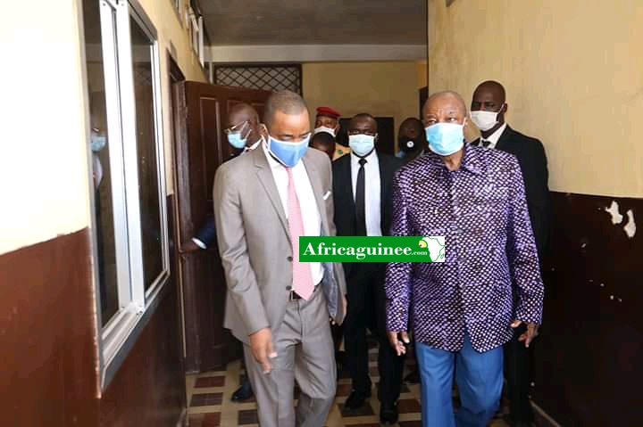 Alpha Condé, président de la République de Guinée et Tibou Kamara, son Conseiller Spécial et porte parole du Gouvernement